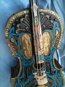 Yes! 'Ports-of-call', carved, Victorian style, black cello. Skull back!