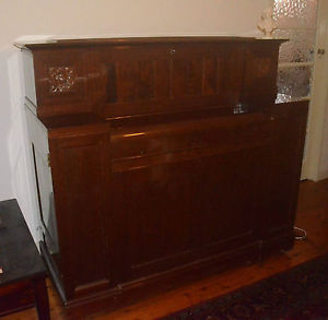 Red Welte Steinway keyboardless reproducing piano