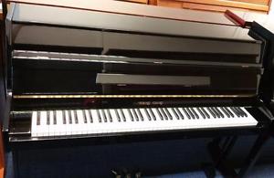 Young Chang upright piano finished in gloss black