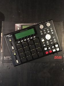 Black AKAI mpc 1000 murder drum and sampling machine with fat pad upgrade