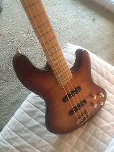Fender Jazz Bass American Deluxe QMT 60th special edition.