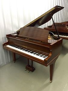 Challen Baby Grand Piano with a Polished Mahogany Case C.1935