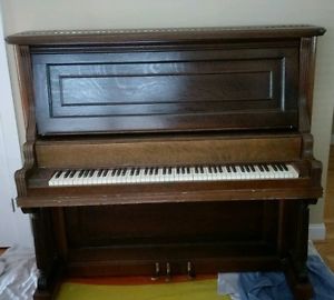 1900-1910 circa Geo Bent wooden upright piano with ivory keys