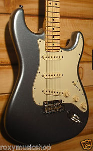 Use Fender® American Deluxe Strat® Plus Maple Fingerboard Mystic Ice Blue w/Case