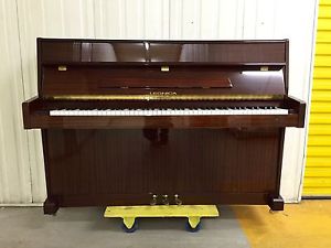 Legnica Modern Upright Piano with a Polished Mahogany Case C.2000