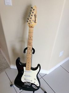 Fender Starcaster electric guitar signed by Clapton