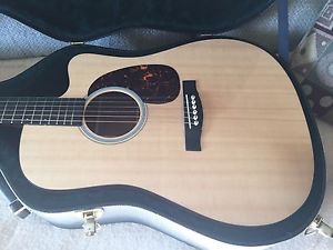Used but excellent condition Martin DCPA4 acoustic electric with case