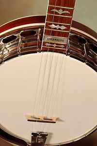 Huber Kalamazoo bluegrass banjo, case and radiused capo