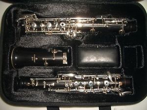 A. Robert Paris wood Oboe serial R237 Professional With left F