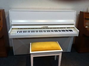 White Fazer piano and stool