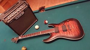 Electric guitar with amplifier and case