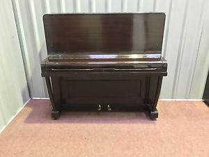 Upright Compact Regent Piano. Gloss Finish In Dark Mahogany.
