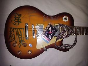 rolling stones autographed guitar ( lespaul design )