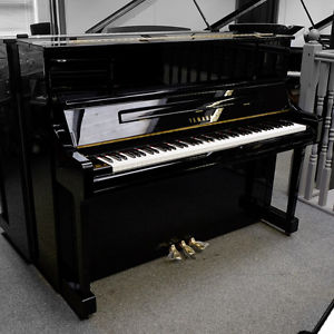 Used Yamaha YU10 upright piano in polished black C2004