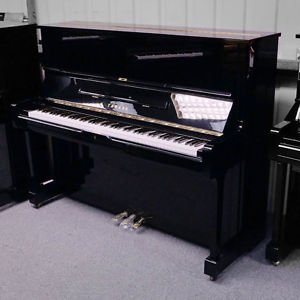 Used Yamaha U1 upright piano in polished black C1985