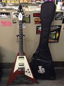 2002 Gibson Faded Cherry Flying V.  This is the rare Crescent Moon Inlay series!