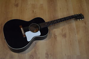 1932 Gibson L-00 black with raised fingerboard.