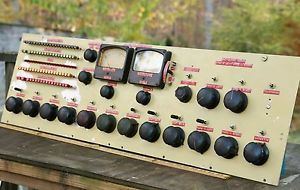 vintage recording console front with 18 Daven Dakaware Triplett meters