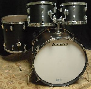 VINTAGE LUDWIG 4 PIECE MAPLE DRUM SET WITH BLACK PANTHER WRAP.