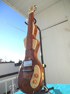 Curly Cherry lap steel guitar with Quilted Maple accents