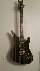 Autographed Schecter Synyster Gates Custom S Black and Gold pinstripe Guitar
