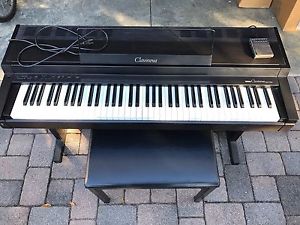 Used Clavinova CLP 100 digital piano rosewood w/stool and Damper Pedal.