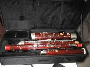 EXTRA CLEAN FOX 222 BASSOON HI D, WITH OUR WARRANTY, ALL NEW PADS, NEW CASE.