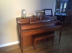 Kranich & Bach Piano and stool.