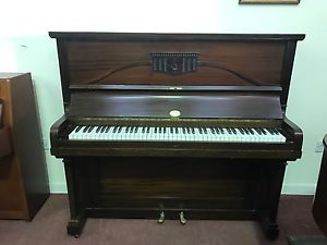 Immaculate Dark Mahogany Piano. Stylish And Compact