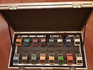 Roland Boss Pedal Board loaded with Boss Effects