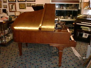 BRINDSMEAD  overstrung baby grand roller action mohogany can deliver £650buy now