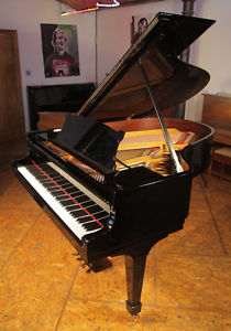 Rebuilt 1926, Steinway Model O grand piano. 88 note keyboard. Free piano stool.