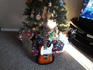 Mint 1997 Fender Telecaster with mint hardshell case tags included