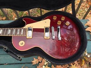 GIBSON LES PAUL DELUXE W/ MINI HUMBUCKERS. WINE  RED.2000. VERY NICE.READ ON