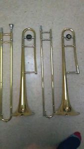 TWO NICE USED GOLD 605 AND 606 KING TROMBONES