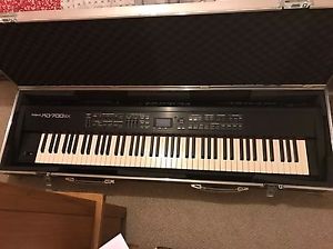 Roland RD700sx Keyboard And Flight Case With Optional Stand and Roland Amp