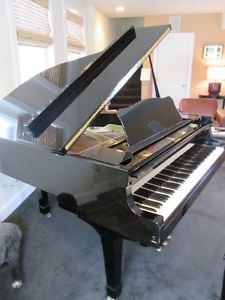 Yamaha baby grand  piano   made in  2000!