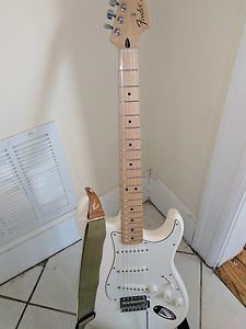 Fender Standard Strat guitar w/case, strings, cable, and stand.