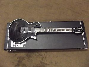 ESP LTD EC1000 Deluxe black elec guitar with floyd rose EMG pups and case