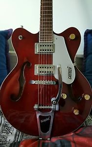 Gretsch G5122 Electromatic Double Cutaway Guitar wooden hard case offers welcome