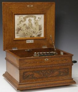 CRITERION CARVED OAK MUSIC BOX WITH 14" DISCS Lot 2025