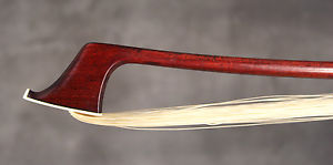 A good cello bow branded "E. SARTORY A PARIS", Peccatte model.