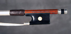 A very fine old violin bow branded "VUILLAUME A PARIS"