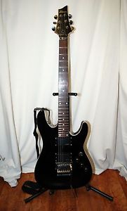 Schecter Diamond Series C-1 FR - Gloss Black with strap and whammy bar