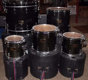 90's Pearl Master Custom Maple Shell Pack with hard cases. Snare not included.