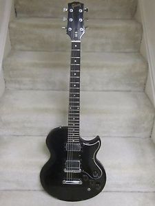 Vintage Gibson L6-S electric guitar- black finish,standard wear,sounds great