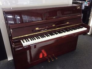 UPRIGHT PIANO BY HAMLYN KLEIN IN MAHOGANY POLYESTER.PRISTINE CONDITION.