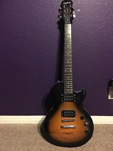 signed lady gaga guitar and framed poster (both w/ letters of authenticity)