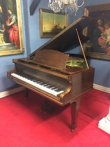 Immaculate Rogers grand piano. Delivery available