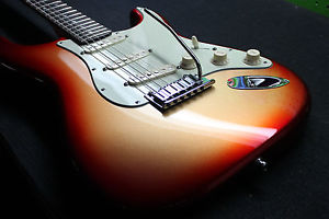 Used Fender American Deluxe Stratocaster Rosewood Fretboard Sunset Metallic OHSC
